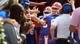 Gator football team members greet fans before the first home game at Ben Hill Griffin Stadium against the Tennessee Volunteers on Sept. 16, 2017. The Gators won 26-20 by making a tie-breaking touchdown with zero seconds on the clock. (Emma Green/ WUFT News)