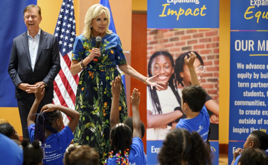 First lady Jill Biden speaks to a group of students at a summer learning program at Albertus Magnus College in New Haven. Biden visited New Haven with U.S. Education Secretary Miguel Cardona as part of a three-state tour to highlight how President Joe Biden's American Rescue Plan, which helped fund the program, is helping students catch up on learning after the pandemic.