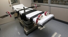 FILE - This Oct. 9, 2014, file photo shows the gurney in the execution chamber at the Oklahoma State Penitentiary in McAlester, Okla. (AP Photo/Sue Ogrocki, File)