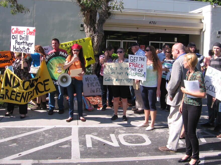 Activists rallied outside a community center in Naples, Fla., before recent hearings on a proposed oil well in the western Everglades.