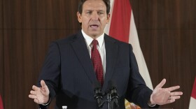 FILE - Florida Gov. Ron DeSantis speaks at a news conference on Jan. 26, 2023, in Miami. David McIntosh, the president of the influential Club For Growth group, said Tuesday, Feb. 7, that the group has invited a half dozen potential Republican candidates for the White House to its donor summit in Florida next month including DeSantis. (AP Photo/Marta Lavandier, File)