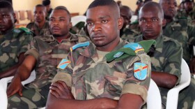 Soldiers on charges including rape and murder during a 2012 army offensive wait for their trial in a Goma military court on May 5, 2014. (Alain Wanimoyi/AFP/Getty Images)