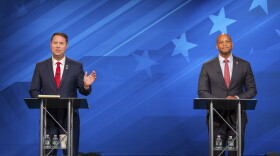 This image released by Maryland Public Television shows gubernatorial candidates Republican Dan Cox, left, and Democrat Wes Moore during a debate, Wednesday, Oct. 12, 2022, in Owings Mills, Md. (Maryland Public Television/Michael Ciesielski via AP, Pool)