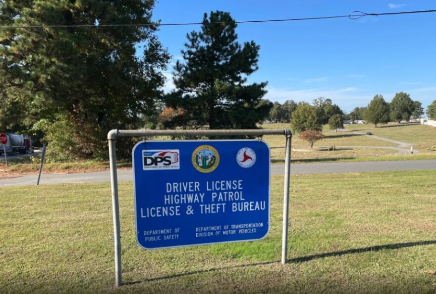 A sign for a DMV office in Durham, NC.