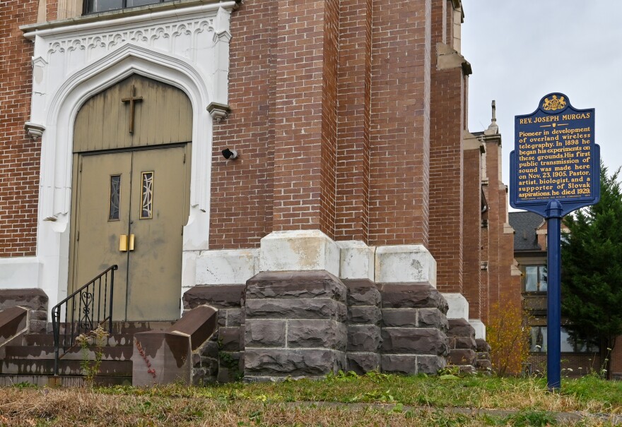 A historical marker outside of the former Sacred Heart Church on North Main Street in Wilkes-Barre explains that Father Murgas experimented with transmission of sound at this site.