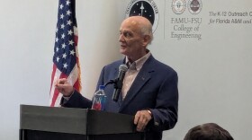 Dr. Norm Thagard told the audience of his personal connection with the majority of the Challenger astronauts.