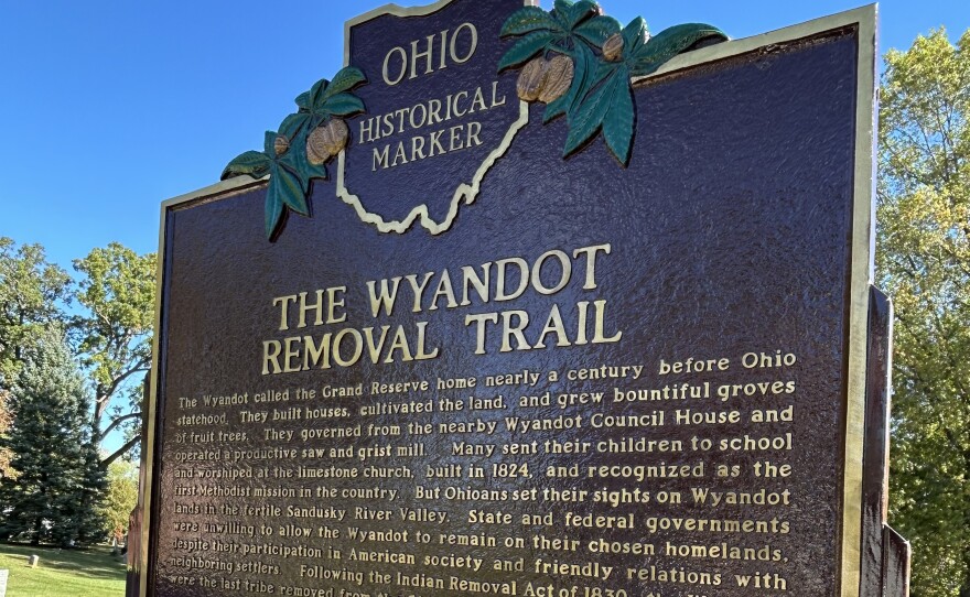 a brown historical marker 
