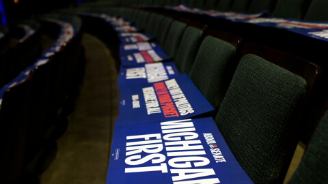 Michigan First signs lay on seats before a rally for Michigan Senate candidate Abdul El-Sayed Sunday, Oct. 25, 2026, in Grand Rapids, Mich. (AP Photo/Kristen Norman)