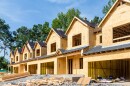 New Row House Construction with wood sheathing and an asphalt roof