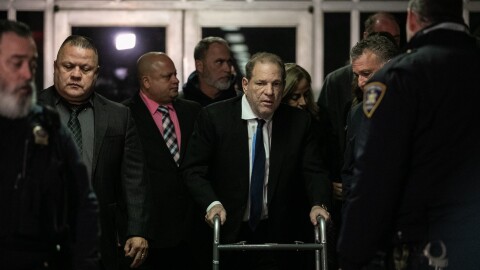 Harvey Weinstein (center) leaves a bail hearing last month in New York City. The former Hollywood megaproducer has been accused of sexual misconduct by dozens of women. He now faces five charges in New York City.