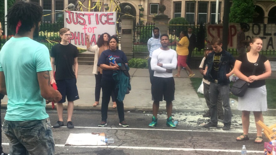 About 200 people gathered outside the Minnesota Governor's Residence in St. Paul on Thursday, protesting the fatal shooting of a man by a police officer. Philando Castile was shot in a car Wednesday night in the St. Paul suburb of Falcon Heights.