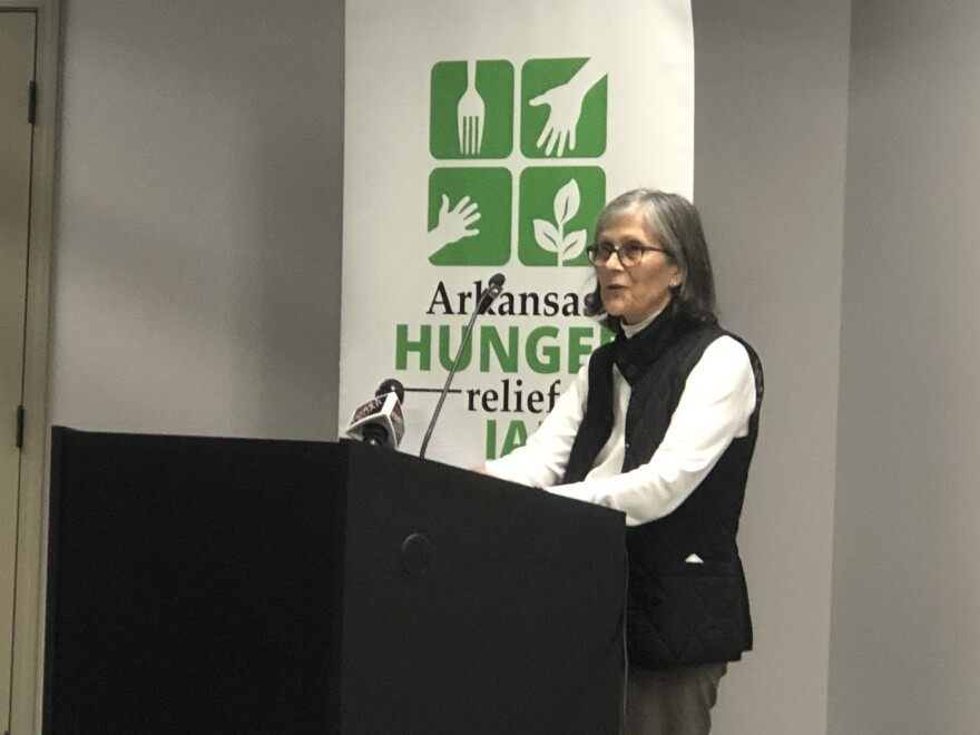 Kathy Webb, CEO of the Arkansas Hunger Relief Alliance and co-chair of the Governor’s Food Desert Working Group, presents the group's final report at a news conference at Little Rock Union Station on Friday.