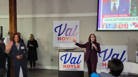 Candidate Val Hoyle declares victory as she addresses a group of supporters at an election night watch party at the Firefighters Union Hall in Eugene.