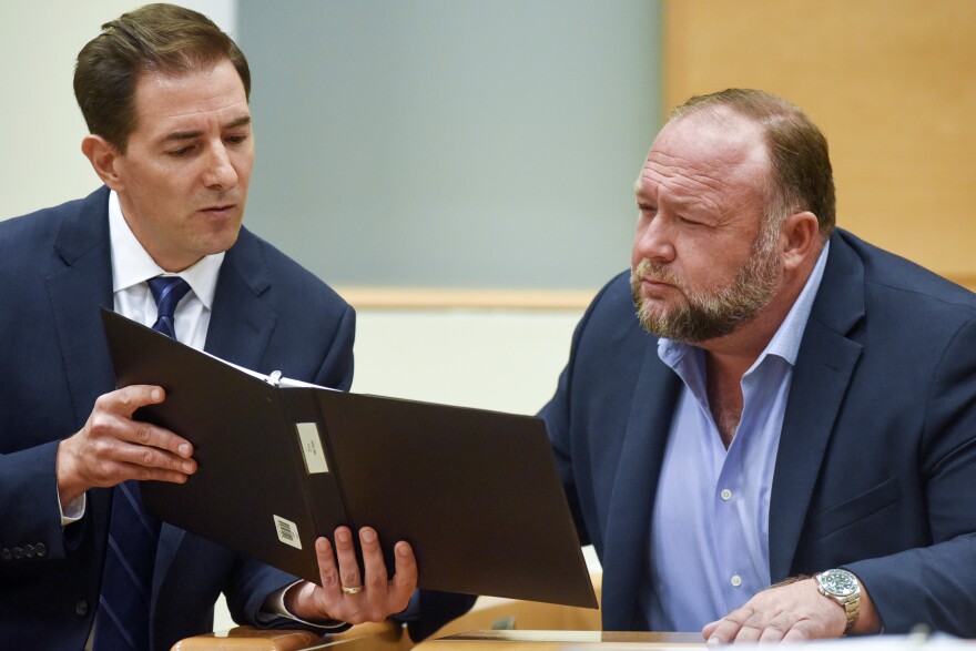 Plaintiff's attorney Chris Mattei, left, questions Infowars founder Alex Jones during testimony at the Alex Jones Sandy Hook defamation damages trial at Connecticut Superior Court in Waterbury, Conn. Thursday, Sept. 22, 2022.