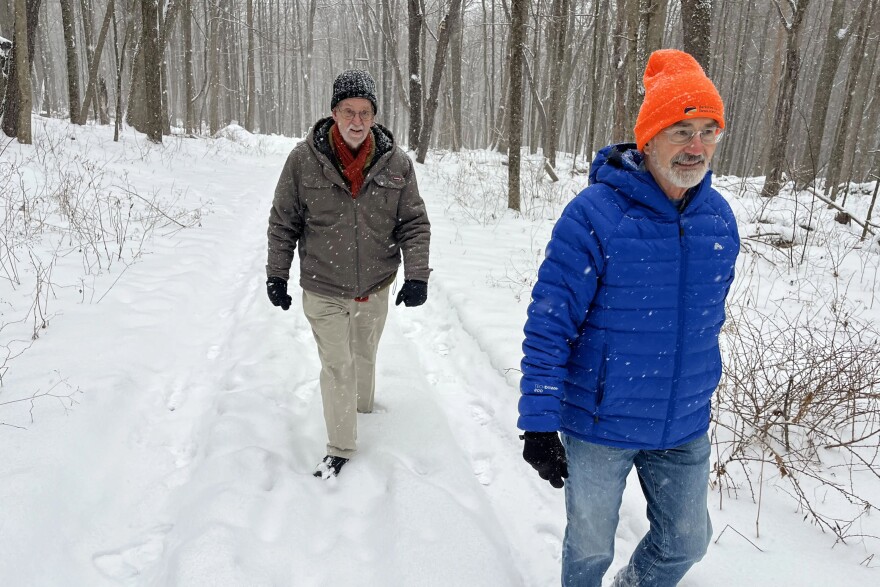 Historians Bernie Drew, left, and Rob Hoogs trek through Beartown State Forest in Monterey in search of clues to Henry Knox’s journey 250 years ago.