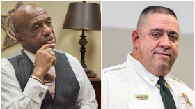 Mecklenburg Sheriff Garry McFadden (left) promoted Jeff Eason to major in 2019. Eason said McFadden created "chaos" at the main detention center uptown.