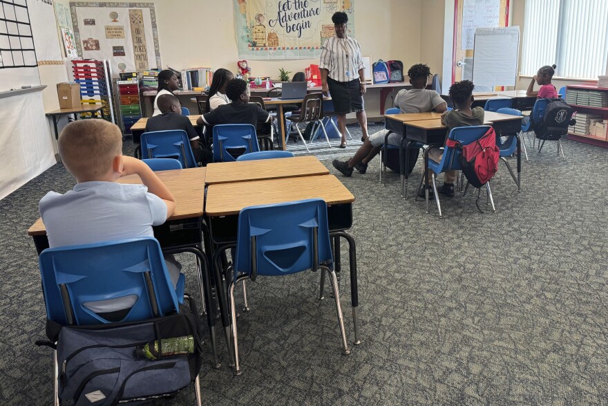 Mannika Hopkins talks with her fourth graders on the first day of school at Greenville Elementary in Greenville, Fla. on Aug. 14, 2024. (AP Photo/Kate Payne)