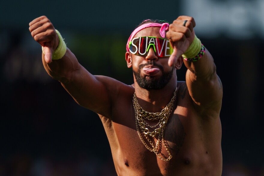 A member of the Party Animals dance team gives a thumbs down to the Banana fans during a baseball game between the Savannah Bananas and the Party Animals at Busch Stadium on Friday, July 18, 2025, in downtown St. Louis.