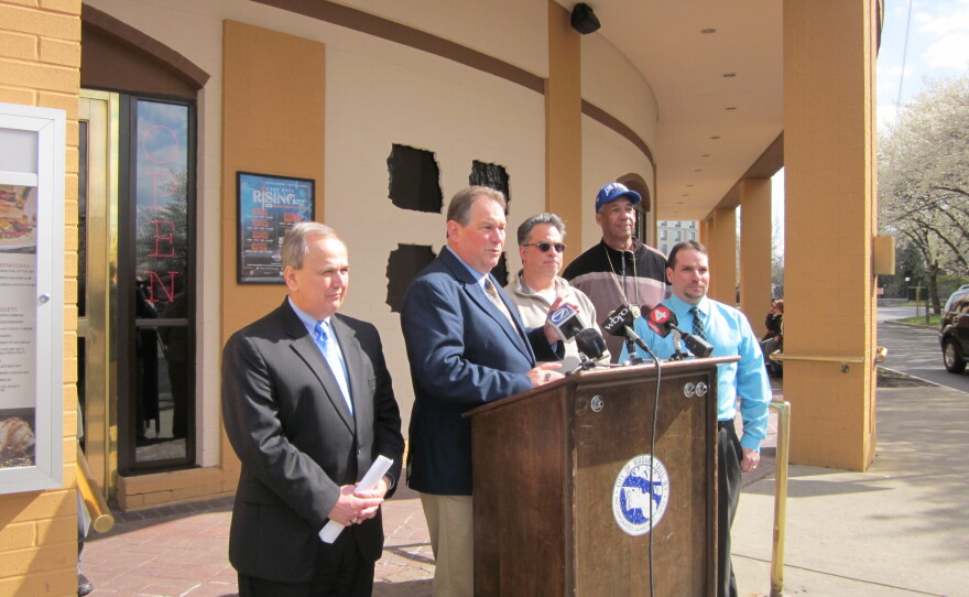 Legislators discuss sign issue in front of Hard Rock Cafe