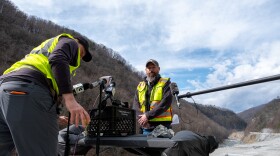 Nathan Tanner, with NCDOT, speaks with reporters on the side of the newly-repaired stretch of I-40 alongside Pigeon River Gorge on Feb. 27, 2025.