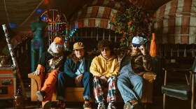  Photograph of The Iceman Special sitting together on a couch 