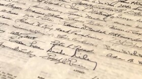 A copy of the Alaska constitution at Vic Fischer’s home. Fischer is the last surviving delegate from the 1955 Alaska Constitutional Convention. (Lori Townsend/Alaska Public Media)