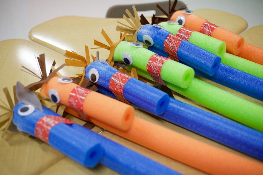 Props for Ackerman's North Pole Follies include these horses made from pool noodles for a Holiday Hoedown number. 