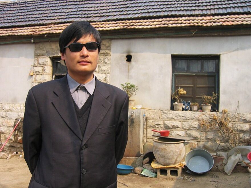 This undated handout image provided by ChinaAid shows blind Chinese legal activist Chen Guangcheng, whose escape from house arrest is at the heart of a growing U.S.-China firestorm.