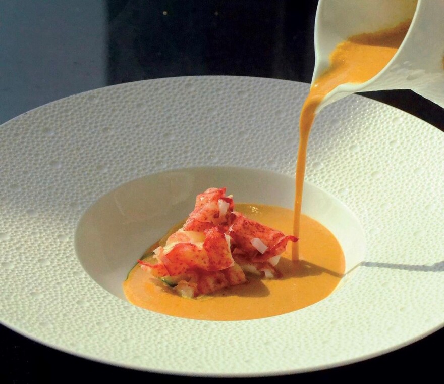 A bowl of Chef Wolf's signature lobster soup - Credit: @chefwolf/Instagram