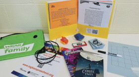 WKAR Family Reading Kit, featuring books, learning activities, and gear. 