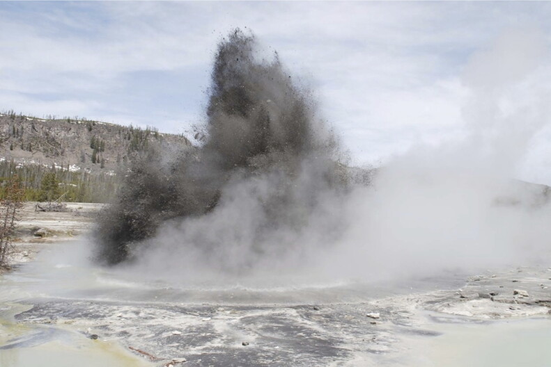 A hydrothermal event is seen in Biscuit Basin in Yellowstone National Park in 2009. Yellowstone officials say a similar explosion on Tuesday, July 23, 2024, sent tourists running for cover and destroyed a boardwalk. They say such events are relatively common.