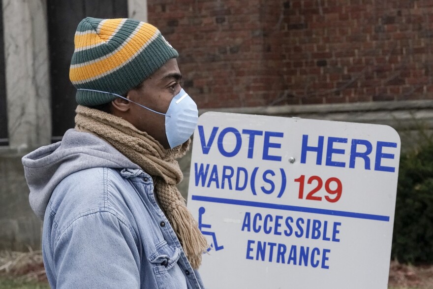 A voter in line in Milwaukee during this month's Wisconsin election. Voting took place after multiple lawsuits to change absentee ballot deadlines, a possible preview of legal battles to come in 2020.