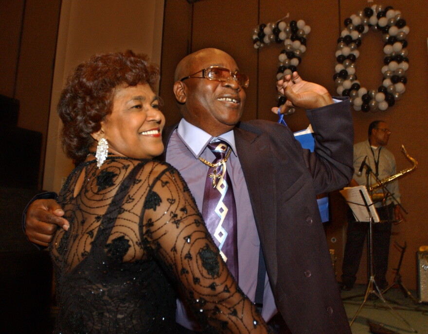Calypso star, Slinger Francisco, otherwise known as 'The Mighty Sparrow,' right, celebrates his 70th birthday dancing calypso with Caribbean community leader Jean Alexander at a reception in his honor in the Brooklyn borough of New York, July 29, 2005.
