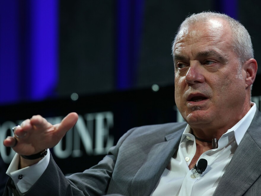 Former Aetna chairman and CEO Mark Bertolini speaks at conference in San Francisco in 2015. Bertolini is an avid motorcyclist and skier, and he fended off Aetna's efforts to limit him from those hobbies.