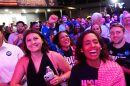 Attendees listen as Abdul El-Sayed speaks during a primary election night event. 