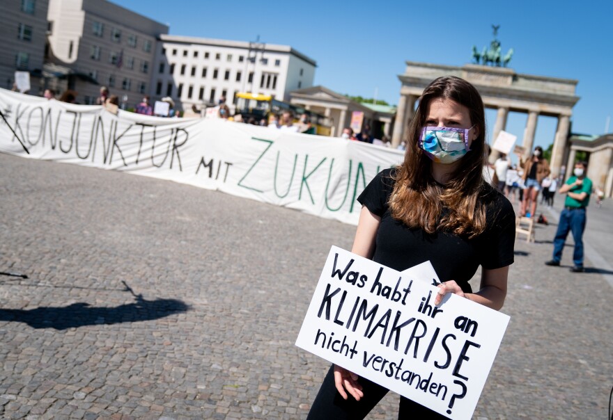 Luisa-Marie Neubauer of Fridays for Future takes part in a demonstration in front of the Brandenburg Gate in Berlin on June 2. The protest took place while government leaders discussed economic stimulus and other strategies in the fight against the coronavirus.