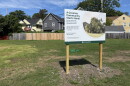 A sign at 354 Driving Park Ave., Rochester, informing passers-by of the city's plans to turn the lot into a forest.