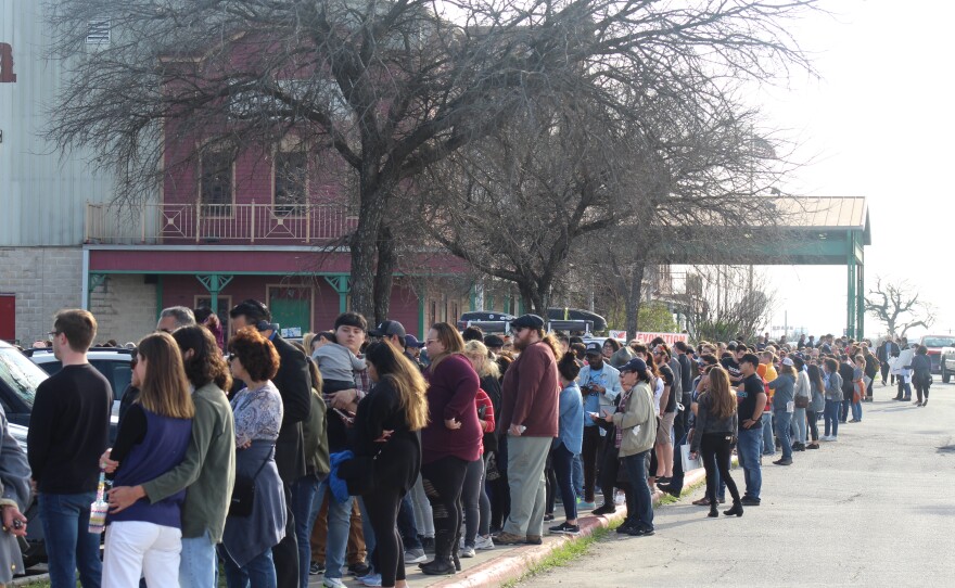 Hundreds line up for Sanders' rally at Cowboys Dancehall in San Antonio on Saturday.