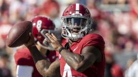 Alabama quarterback Jalen Milroe (4) warms up before an NCAA college football game against Arkansas, Saturday, Oct. 14, 2023, in Tuscaloosa, Ala. (AP Photo/Vasha Hunt)