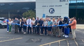 Representatives of Deaconess Illinois and John A. Logan College cut the ribbon on the medical clinic at Logan Fitness.