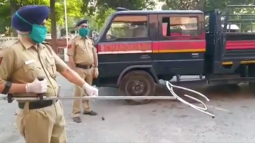 Police in Chandigarh, India, tweeted a video of officers using a pole with a movable, two-pronged claw for catching a suspect around the waist.
