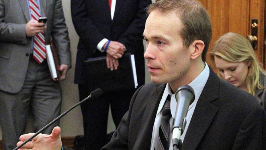 Chris Leeuw, a spinal cord injury survivor, testifies Wednesday before the Senate Health & Provider Services Committee about funding treatment for similar injuries.