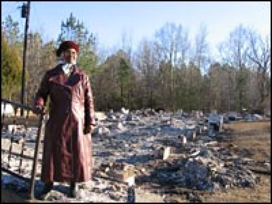 Hazel White, 73, is a lifetime member of Galilee Baptist Church. The small church in Panola, Ala., burned to the ground in a suspected arson fire. All that's left is the twisted iron railing and front steps.