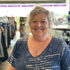 Carol Rose stands inside the WRC Thrift Store on U.S. 31 in Garfield Township. She's worked there for 40 years and is being honored by WRC for her many years of service. (Photo: Ed Ronco / IPR News)