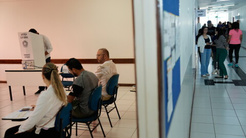 A casts his ballot using electronic voting machines during general elections in Brasilia, Brazil, Sunday, Oct. 4, 2026.