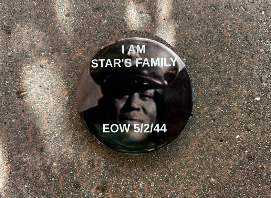 A pin that reads "I am Star's Family" and includes the date of his EOW, or End of Watch, May 2nd 1944.