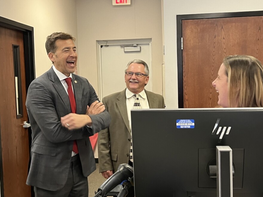 Illinois Secretary of State Alexi Giannoulius visits with employees and managers at a Peoria DMV during a visit on Thursday, Feb. 23, 2023.