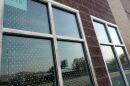 One of the windows at East Junior High covered with dots as part of Project Skyward.