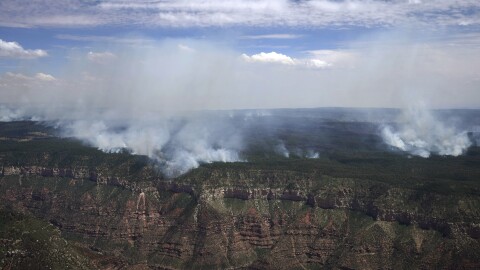 The Dragon Bravo Fire continues to burn on the Grand Canyon's north rim Saturday, July 19, 2025. (Joe Rondone/The Arizona Republic via AP, Pool)