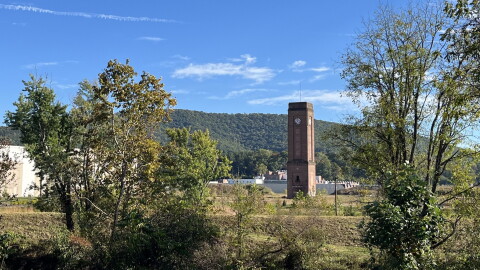 Asheville City Council on Tuesday approved a Costco warehouse store to be located in Enka on land behind the historic Enka clock tower in this photo. The tower, which dates from a time when a massive textile mill sat on the property, is to be preserved as part of the project.